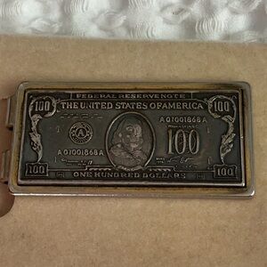 Engraved Silver Money Clip with Dollar Bill Design.